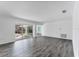 Spacious living room with sliding glass doors to backyard at 2420 Sunnyside St, Sarasota, FL 34239