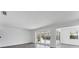 Bright and airy living area with view of the pool at 2420 Sunnyside St, Sarasota, FL 34239