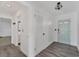 Bright and airy entryway with light wood floors at 2420 Sunnyside St, Sarasota, FL 34239