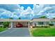 Attractive condo with carport and manicured lawn at 2609 Riverbluff Pkwy # 146, Sarasota, FL 34231