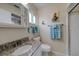 Clean bathroom, featuring granite countertops and a shower/tub combo at 2609 Riverbluff Pkwy # 146, Sarasota, FL 34231