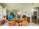 Casual dining area with table and chairs, adjacent to kitchen at 2609 Riverbluff Pkwy # 146, Sarasota, FL 34231