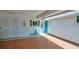 Quaint entryway with light-colored walls and teal door at 2609 Riverbluff Pkwy # 146, Sarasota, FL 34231
