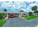 Cute and cozy condo with carport parking and well-maintained landscaping at 2609 Riverbluff Pkwy # 146, Sarasota, FL 34231