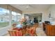 Sunroom with glass windows, seating area, and view of backyard at 2609 Riverbluff Pkwy # 146, Sarasota, FL 34231