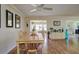 Bright dining area with table and chairs near kitchen at 2609 Riverbluff Pkwy # 146, Sarasota, FL 34231