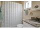 Updated bathroom with granite vanity and shower/tub combo at 2609 Riverbluff Pkwy # 146, Sarasota, FL 34231