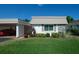 Condo with carport and neatly trimmed lawn at 2609 Riverbluff Pkwy # 146, Sarasota, FL 34231