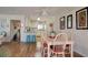 Dining area with table and chairs, open to kitchen at 2609 Riverbluff Pkwy # 146, Sarasota, FL 34231
