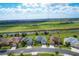 Aerial view of houses with green surroundings at 2760 Suncoast Lakes Blvd, Punta Gorda, FL 33980