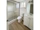 Clean bathroom with a shower/tub combo, toilet and vanity at 3696 Lake Bayshore Dr # K409, Bradenton, FL 34205