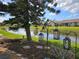 Landscaped backyard with water view and lighting at 3906 40Th W St, Bradenton, FL 34205