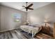 Bedroom with wood-look flooring and neutral tones at 409 147Th Ne Ct, Bradenton, FL 34212