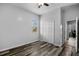 Bedroom with closet, window, and wood flooring at 409 147Th Ne Ct, Bradenton, FL 34212