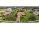 Inviting single-story home with lush green lawn and mature landscaping in a desirable neighborhood at 409 147Th Ne Ct, Bradenton, FL 34212
