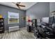 Home office with ceiling fan, natural light, and desk at 409 147Th Ne Ct, Bradenton, FL 34212
