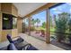 Screened patio with comfortable seating and views of the landscaped backyard at 409 147Th Ne Ct, Bradenton, FL 34212