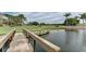 Wooden footbridge over water on golf course at 5122 Marsh Field Rd # 62, Sarasota, FL 34235