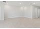 Large living room with tile floors and recessed lighting, perfect for gatherings and relaxation at 5719 Woodland Sage Dr, Sarasota, FL 34238