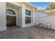 Elegant entryway with double doors and a sitting area at 6817 Riverview Blvd, Bradenton, FL 34209