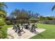 Relaxing firepit area with seating on patio at 6817 Riverview Blvd, Bradenton, FL 34209