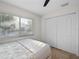 Bedroom with a queen bed and large closet at 6817 Riverview Blvd, Bradenton, FL 34209