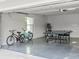 Garage with ping pong table, bicycles, and game area at 6817 Riverview Blvd, Bradenton, FL 34209