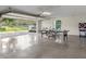 Spacious garage with ping pong table and room for recreational activities at 6817 Riverview Blvd, Bradenton, FL 34209