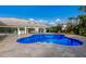 Stunning freeform pool with large patio at 6817 Riverview Blvd, Bradenton, FL 34209