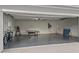 Garage with ping pong table, bicycles, and game area at 6817 Riverview Blvd, Bradenton, FL 34209