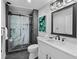 Modern bathroom with a marble shower and stylish vanity at 6817 Riverview Blvd, Bradenton, FL 34209