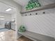 Convenient laundry room with washer, dryer, and built-in storage at 6817 Riverview Blvd, Bradenton, FL 34209