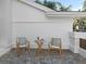 Small patio with two chairs and a table at 6817 Riverview Blvd, Bradenton, FL 34209