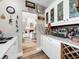Stylish wet bar with ample storage and a view into the living area at 7317 Crape Myrtle Way, Sarasota, FL 34241
