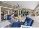 Open-concept patio with seating area and view of the living room at 7317 Crape Myrtle Way, Sarasota, FL 34241