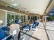 Relaxing patio with comfortable seating overlooking the pool at 7317 Crape Myrtle Way, Sarasota, FL 34241
