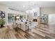 Spacious living room with hardwood floors and fireplace at 7317 Crape Myrtle Way, Sarasota, FL 34241