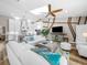 Open-concept living space with a well-appointed kitchen, inviting seating, and a bright, airy atmosphere at 7317 Crape Myrtle Way, Sarasota, FL 34241