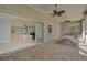 Outdoor kitchen and patio area with built in grill and seating at 854 Macewen Dr, Osprey, FL 34229