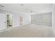 Spacious bedroom with carpet, walk-in closet, and attached bathroom at 854 Macewen Dr, Osprey, FL 34229