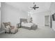 Main bedroom with large bed, sitting area, and ample natural light at 854 Macewen Dr, Osprey, FL 34229
