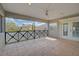 Relaxing screened porch with tile flooring and scenic views at 854 Macewen Dr, Osprey, FL 34229