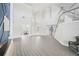 Two story living room with high ceilings and wood flooring at 854 Macewen Dr, Osprey, FL 34229