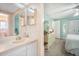 Bright bathroom with updated vanity and flooring at 2107 Palma Sola Blvd # 38, Bradenton, FL 34209