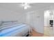 Cozy bedroom with a full-size bed and ceiling fan at 1105 58Th S St, Gulfport, FL 33707