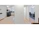 View down hallway showcasing kitchen and office at 1105 58Th S St, Gulfport, FL 33707
