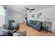Spacious living room with hardwood floors and two armchairs at 1105 58Th S St, Gulfport, FL 33707