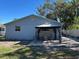 Covered patio area in the backyard, perfect for outdoor dining at 1105 58Th S St, Gulfport, FL 33707