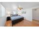 Main bedroom with king-size bed and ceiling fan at 1105 58Th S St, Gulfport, FL 33707