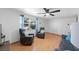 Living room with hardwood floors, ceiling fan, and comfortable seating at 1105 58Th S St, Gulfport, FL 33707